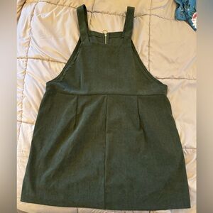 Green corduroy-like dress with gold zipper